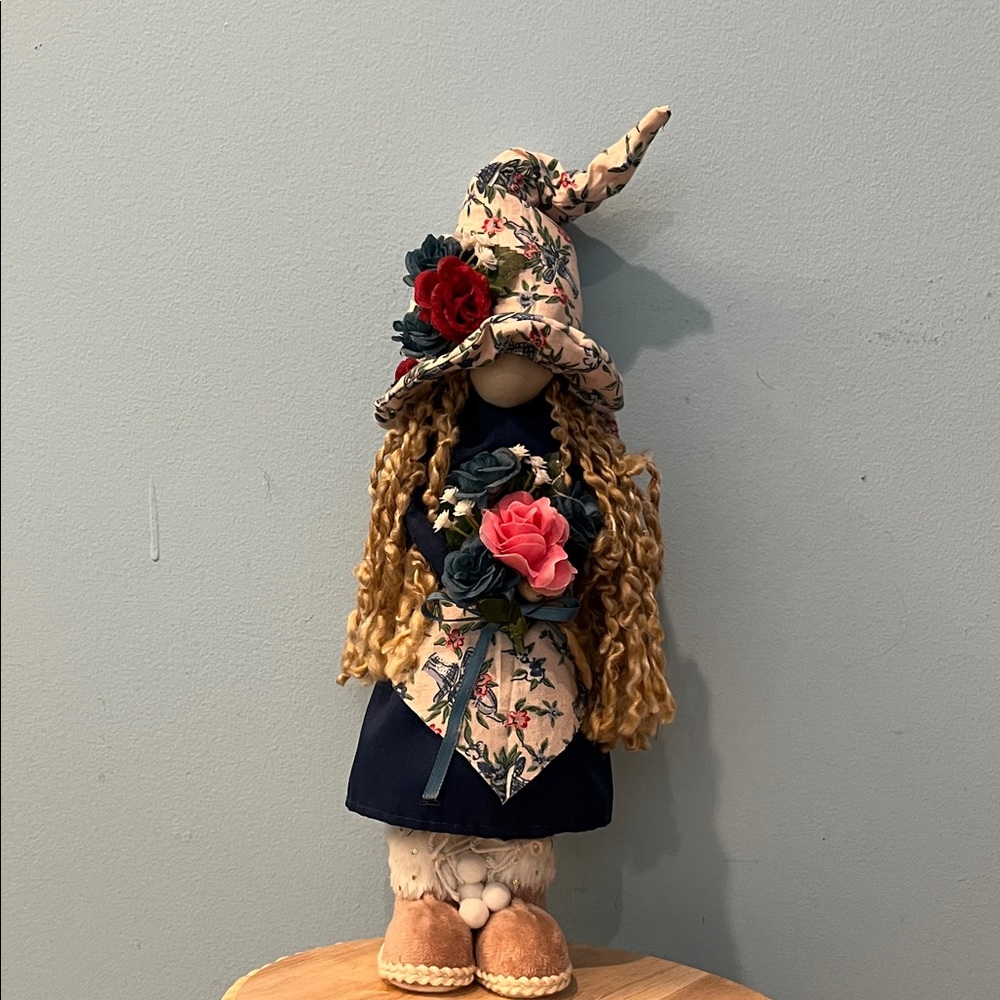 Adorable handmade Gnome Doll with red, blue and pink Roses. Cute hat and apron.